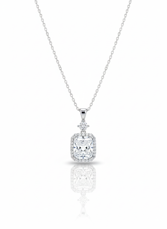 A sterling silver necklace with a minimalist, outline-style butterfly pendant, displayed against a soft neutral background.
