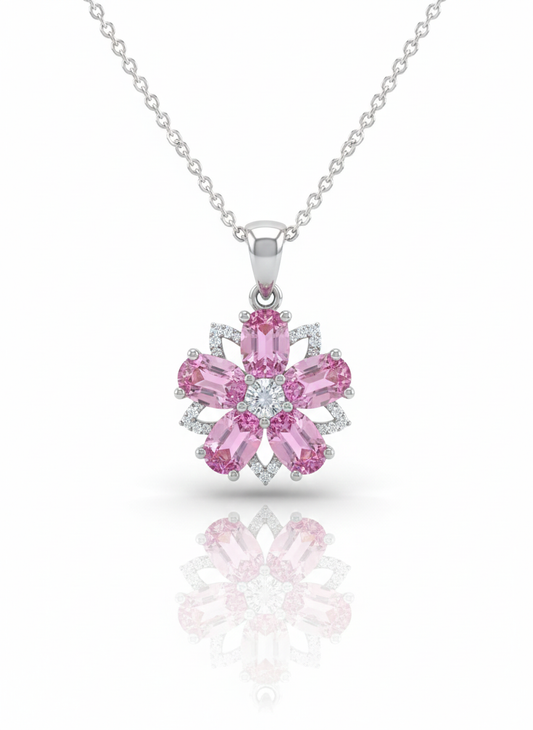 A sterling silver necklace with a flower-shaped pendant on a white background. The pendant features six oval-cut pink gemstones for petals, a central white diamond, and small accent diamonds, with a soft reflection below.
